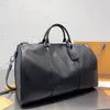 Duffle Bag Seyahat Bag Bagaj Tasarımcı Duffles Bags Kadın Tasarımcılar Çanta Moda Klasik Kapasite Büyük Kapasite Siyah Renk Bagajı 50cm