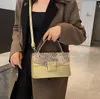 Kvinnor Tygväska axelväskor för kvinnors varumärke Kvinna Travel Shopper Messenger Bag Luxury Designer Handväska Purses 5066C