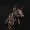 Luxurys Marca Designer Letras Cartoon Animal Pequeno Cão Criativo Chaveiro Acessórios Chaveiro PU Couro Carta Padrão Carro Chaveiro Jóias Presentes Acessórios