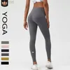 2023 Desginer Al Yoga Pants V-formade midja och höftlyftande sportstrumpbyxor T-line naken Running Fitness Pants