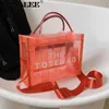 Totes transparente PVC grande marca a bolsa de designer de sacola bolsas de ombro de malha transparente Mulheres geléia de mão casual Compras de praia HKD230822