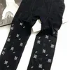 Designer Donna Lettera Calze a rete Collant di lusso Collant alla moda Collant con piedi sexy da donna Calze lunghe nere Versatile inverno