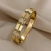 Bangle flashbuy Creative rostfritt stål korsar ovanliga mode armband armband uttalande 18k guldplatta vattentäta smycken 230821