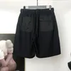 メンズショーツの首謀者カジュアル2023夏の日本のMMJルーズファッションブランドジッパードローストリングポケットカプリスパンツ