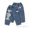 Moda Ragazzi jeans stampati con lettera pantaloni per bambini doppia tasca elastica in vita 2023 pantaloni autunnali larghi da cowboy casual per bambini Z3655