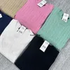 2023 Neue Frauenpullover Fashion American Classic Brand Laurens Kurzarm Sommer Runde Hals gebratene Teig-Wendungen Strickt T-Shirt