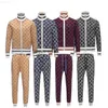 TRACKSUITS MENS SOMMER SOMMER CASUAL MODE DESIGNER TRACKSUITSR TOPS MEN PANTS JOGGING BREATABLE Sportkläder Tvådelad kostym 07