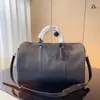 Le sac à bagages standard original classique 45 50 55 valise de voyage en cuir pour hommes sac à bandoulière de haute qualité main pour hommes et femmes ajustement varié Consultation de figure