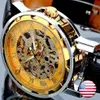 Modesieger schwarzer Lederband Edelstahl Skelett mechanische Uhr für Mann Gold Mechanical Handgelenk Watch247y