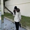 Chaquetas de mujer Chaqueta de plumón de alta calidad Forro interior de nutria de invierno A prueba de viento Cuello de piel de alta gama Cálido