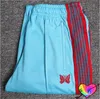 Pantalones para hombres Agujas multicolores Deporte Hombres Mujeres 1 Alta calidad Multi bordado Mariposa Raya AWGE Pantalones 230822