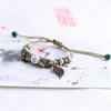 Strand vintage etnisk stil handgjorda smycken kreativ personlighet nypa blommor vävt armband modeflicka kvinnors tillbehör