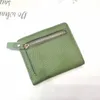 محفظة صغيرة أوروبية وأمريكية قصيرة قابلة للطي للنساء محفظة عملة رقيقة للغاية