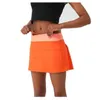 2023 Nuevo L-22 Skirt de tenis plisado Mujeres ropa de gimnasio Sports Femenino Femenino Fitness Dance Yoga Cizazonante Biker de golf Beach Golf