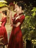 ثياب ثياب قفص صينية من أدوات النفخة الإثنية من طوق Qipao خمر.