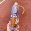 Bouteilles d'eau Bouteille d'enfants de dessin animé mignon pour les boissons en plastique scolaires Transparent Trinkflasche Mist Spray avec de la paille