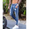 Trendiga män mager jeans cyklist förstörde frayed fit denim rippade byxor sidor rand blyerts hip hop streetwear 210716242a