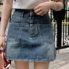 Denim rok Womens Retro Split Pocket Design Modieuze Niche Zomer Hoge Taille Casual Tas Een Lijn Super Kort