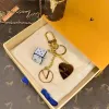 Designer di portachiavi con box Luxurys Key Chain in metallo in lega di astronauta da dadi teschi di cranio Casualmente portachiavi versatili vaso popolare per telefono cellulare cordino all'ingrosso