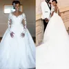 Vintage African 3D Floral Lace Wedding Dresses 2023 Illusion Long Sleeve Appliques Bridal Gowns Chapel Train Robe De Mariee
