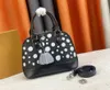 Diseñador de moda Bolso de mano Bolsos de lujo para mujer YK Alma BB Bolsos de hombro Letras de flores de cuero de alta calidad Totes Damas Maquillaje de punto de calabaza