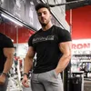 Herren T-Shirts Muskulär T-Shirt Cotton Round Neck Bodybuilding für Männer, die Fitness kurzärmelige grafische Tees Streetwear laufen lassen