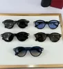 Ny modedesign retro runda solglasögon 0395 acetatram enkel och populär stil mångsidig utomhus UV400 -skyddsglasögon