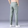 Pantaloni da uomo estate pantaloni casual maschili sottili elasticità morbida elasticità inquieta della tasca a colori solido Corea grigio grigio lavoro da lavoro nero maschio 38 230822