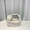 2023 Italy Jodie Handbag Spring/summer New Mini Knitted Cowhide Fashion Versatile Concave Shape Large Capacity Handheld Women's Bag