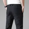 Pantaloni da uomo estate pantaloni casual maschili sottili affari stretch slim fit elastico jogger coreano classico blu nero grigio marca maschio 230822
