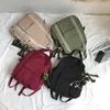 School Bags HOCODO Solid Color WomenS Waterproof Nylon Backpack Simple Bag For Teenage Girl Shoulder Travel 230823