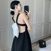 Casual jurken Hoogwaardige Franse Summer Runway Fashion Women Sexy Spaghetti Riem Black Slim Taille Backless Bow Party Midi