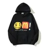 Sweatshirts Mens Designer Hoodies Fashion Streetwear Cpfm Mcdonalds Sweater Co Branded Smiley Face Foam Print High Street Hip Hop Loose Velvet Hooded Pullover Mens