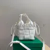 Bolsa de cassetes de grife feminina Bola tecida Oblíqua Bolsa de balde cruzada Sexy Bolsa de festa Senhora Lúdica Luxo Multi Lichaneed Camada de Camada Carteira