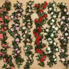 装飾的な花の花輪シルク人工ローズバインハンギングフラワーズ壁クリスマスラタンの偽の偽の植物葉のロマンチックな結婚式の家の装飾230823
