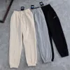 Męskie spodnie flanelowe kobiety swobodne sporne spodni zagęszone termiczne spodni pieszo pieszo Mężczyźni drukujący na markę motocyklowe spodni nk cisb321f