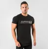 Męskie koszulki muskularna T-shirt Bawełniany kulturystyka okrągłego szyi dla mężczyzn biegających fitness krótkoczestrwałe graficzne koszulki uliczne