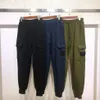 Pants 23SS Stone Spring Island Jogging Men Cotton Soft Compass Badge Högkvalitativ joggare Svettbyxor Långa byxor Sportträning 167o