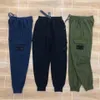 Pants 23SS Stone Spring Island Jogging Men Cotton Soft Compass Badge Högkvalitativ joggare Svettbyxor Långa byxor Sportträning 167o