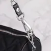 デザイナーショルダーバッグ最新のハンドバッグファッションブランドブラックアンドシルバーミドルクラシックスモールチューブパッケージ1BD232