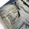 Мужские мотоциклевые джинсы 2023 Новый винтаж разорванные трехмерные карманные джинсовые брюки в средней вайсте модной одежды.