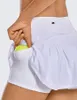 Saias 2023 estilo mulheres esportes esportes short shorts de ioga shorts de cor sólida Tennis Golf Skirt Anti Exposição Fitness Short