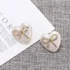 Boucles d'oreilles Vintage en forme de goutte d'huile pour femmes, en alliage de Zinc, strass incrustés, nœud papillon, produits tendance, bijoux pour filles