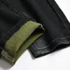 Мужские джинсовые дыры ремесло мужская микро-эластичная тонкая маленькая мода мода взрывной джинсовой дизайн высококачественные брюки.