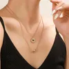 Collares colgantes Diseño de nicho Personalidad Dos conjuntos Collar en forma de corazón Perla Ojo del diablo Tendencia para mujeres