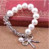 Bracelets porte-bonheur L008 doux Pulseras Bowknot simulé perle Bracelet perlé pour les femmes élastique arc bijoux de mariage bracelets