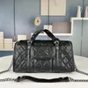 Sac de créateur de luxe Sac polochon de grande capacité Fourre-tout de voyage pour femme Sac à main Boston pour homme Sac à main en cuir de luxe Sac à bandoulière Taille 32x19x14