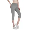 Pantalon actif Yoga Capri pour femme avec poches Legging taille haute pour l'entraînement