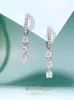 Boucles d'oreilles à tige en argent sterling 925 à la mode et luxueuses avec diamant blanc incrusté de style à haute teneur en carbone
