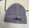 Autunno e inverno nuovo berretto di lana lettere cappello lavorato a maglia cappello da padrone di casa cinese cappello da uomo e da donna caldo berretto alla moda